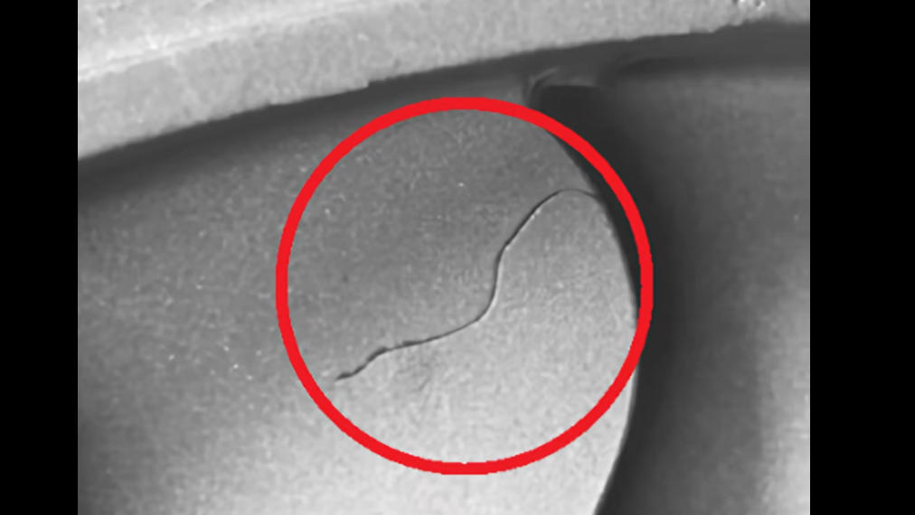 Cold shut defect on aluminum die cast surface showing unbonded seam