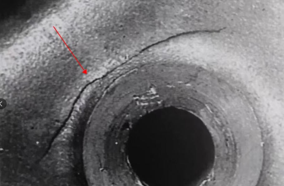 Macro view of severe hot tearing in aluminum casting at thick junction area, illustrating high-temperature shrinkage stress